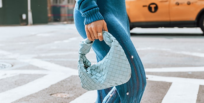 blue Bottega Veneta Jodie Handbag with a girl on street