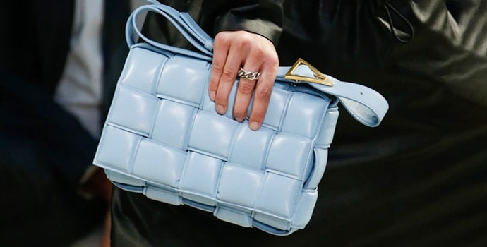 Bottega Veneta Padded Cassette blue Bag in hands of a office lady