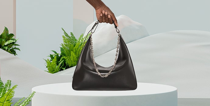 Top Luxury Designer Bags Givenchy Moon Cut Out black Hobo Bag on table