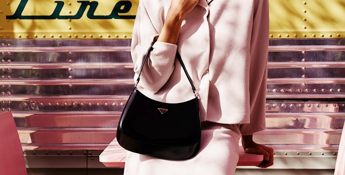 Prada Cleo black Handbag with a corporate lady 