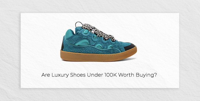 a luxury brand shoe with side image blue in color and beige sole