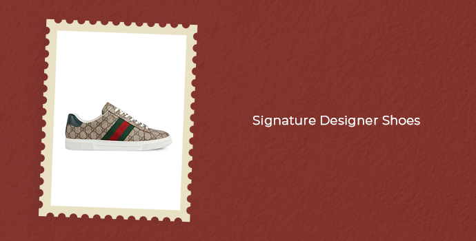 Signature designer sneaker featuring a Gucci-inspired monogram and stripe design